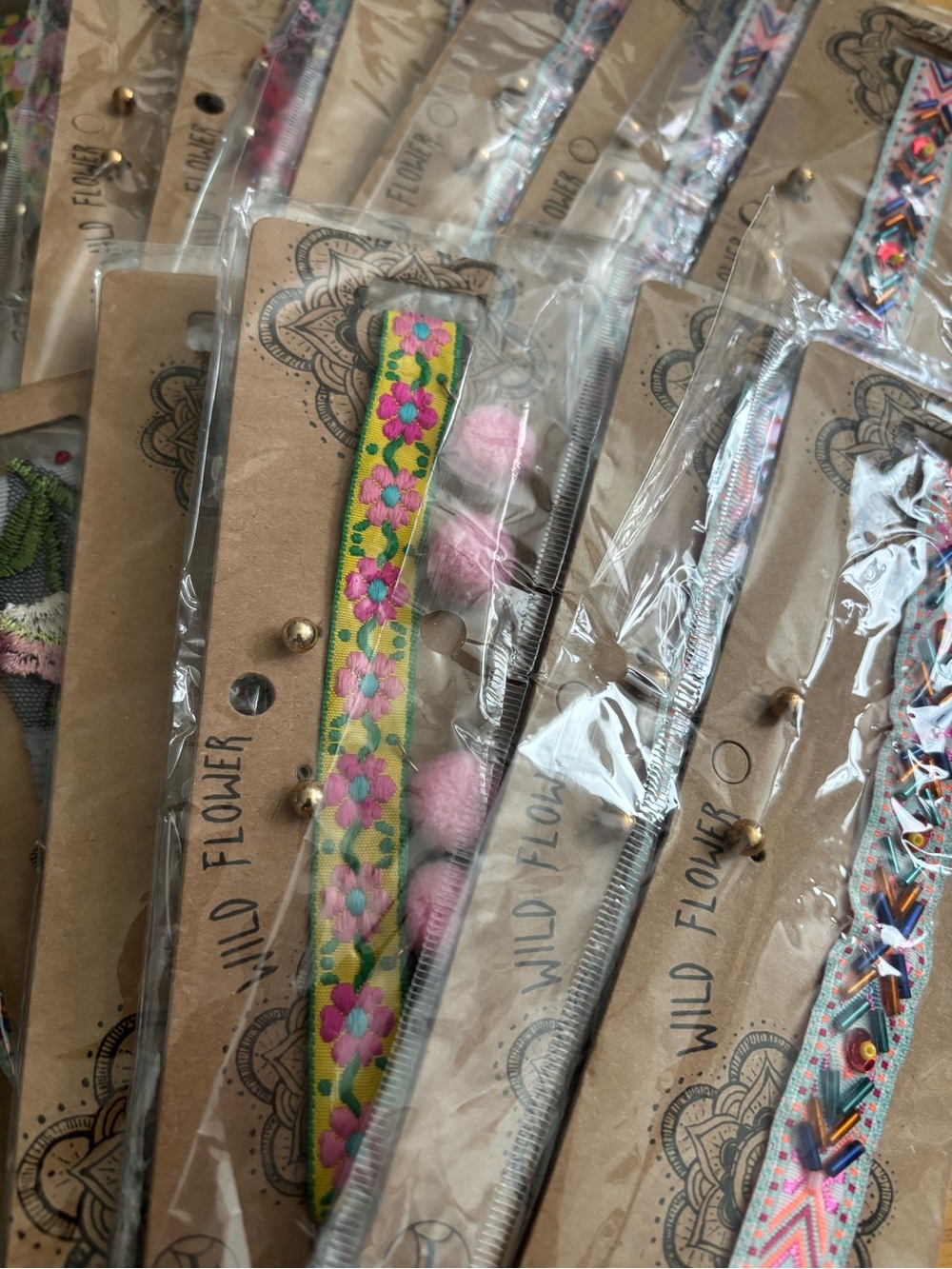 13 Wildflowers Bright Yellow Floral Ribbon Chokers with Pink Pom Poms